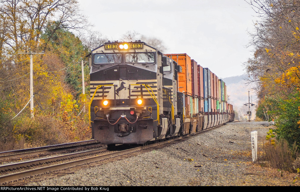 NS 4183 leads a short stack train west through Blandon